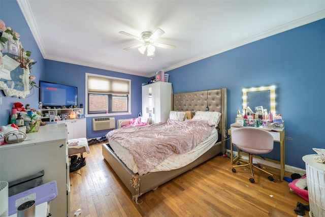 bedroom with hardwood / wood-style floors, ceiling fan, and ornamental molding