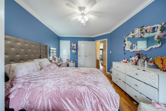 bedroom featuring ceiling fan, ornamental molding, and light hardwood / wood-style floors