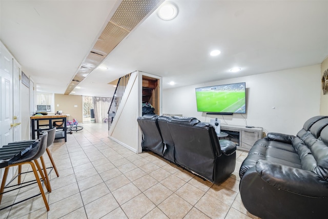 living room featuring light tile patterned flooring