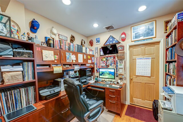 home office featuring visible vents, recessed lighting, and wood finished floors