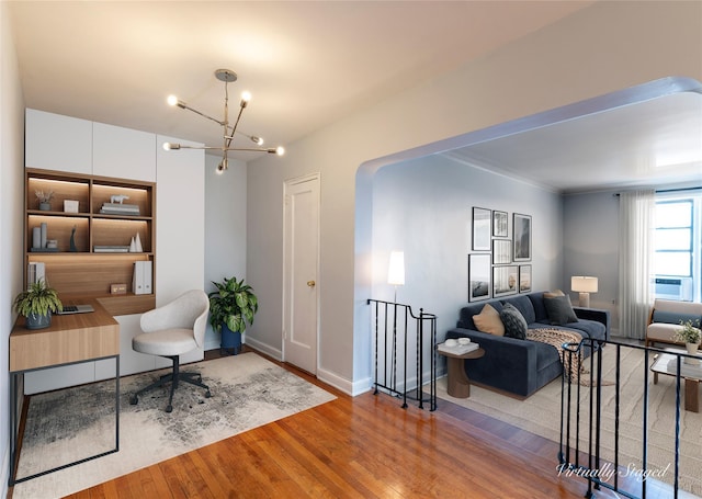 interior space with a chandelier and light wood-type flooring