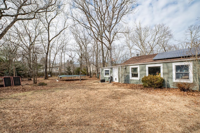 view of yard with a trampoline