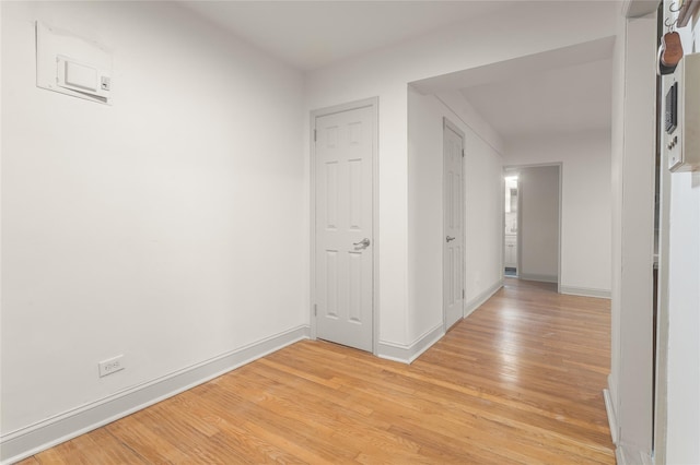 hallway featuring light wood-type flooring