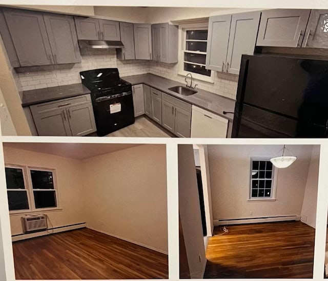 kitchen featuring sink, decorative light fixtures, baseboard heating, gray cabinets, and black appliances