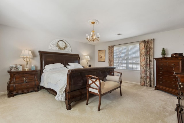 carpeted bedroom with a chandelier