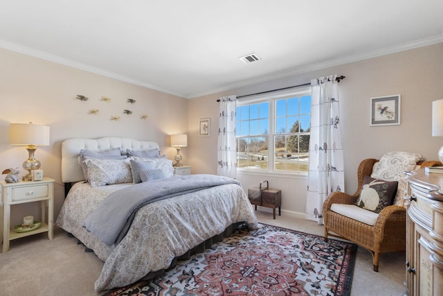 bedroom with ornamental molding and light colored carpet