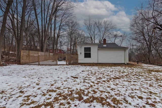 view of snow covered property