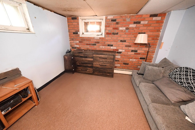 living room with a baseboard heating unit and light colored carpet