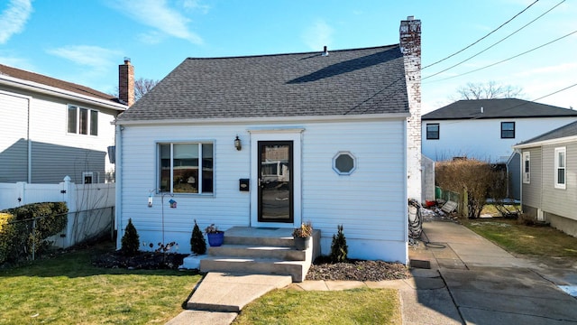 front facade with a front lawn