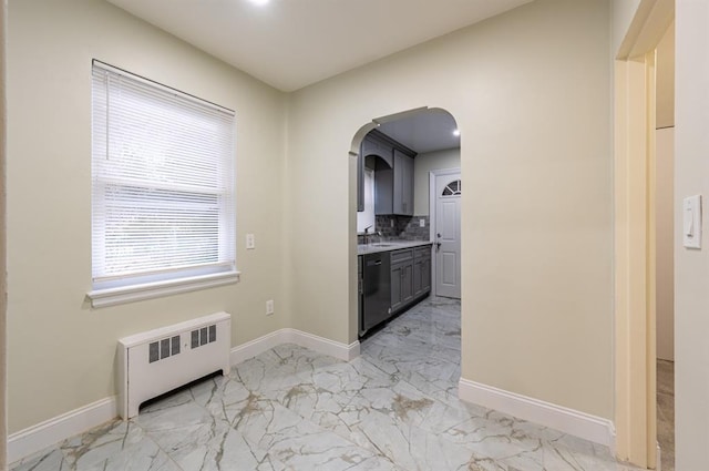 corridor with radiator and sink