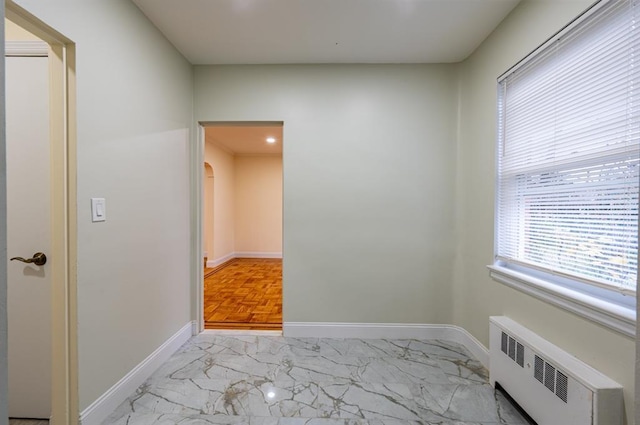 bedroom with radiator heating unit