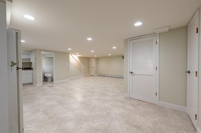 basement featuring baseboard heating