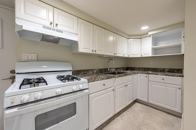 kitchen with white cabinetry, sink, gas range gas stove, and light tile patterned floors