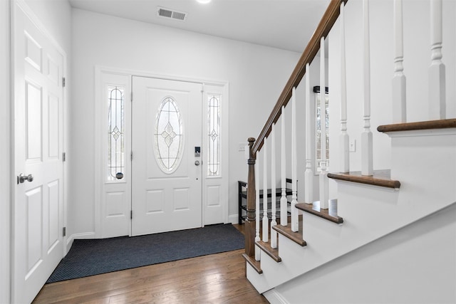 entryway with wood-type flooring