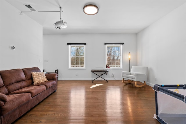 living room with dark hardwood / wood-style floors