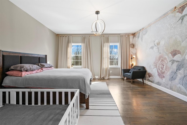 bedroom featuring wood-type flooring