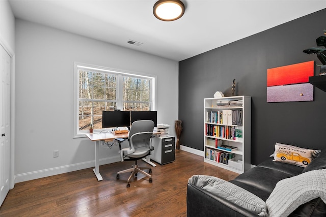 office area featuring dark wood-type flooring