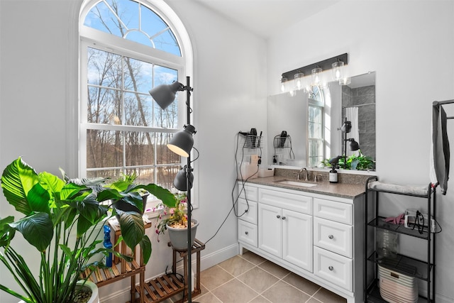 bathroom with tile patterned flooring, vanity, and a shower with shower curtain