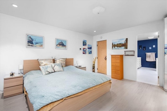 bedroom featuring light hardwood / wood-style floors