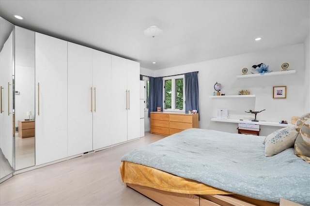 bedroom featuring light hardwood / wood-style floors