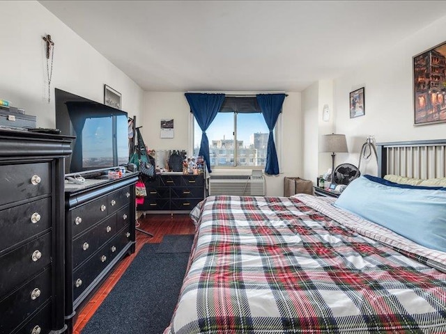 bedroom featuring dark hardwood / wood-style floors