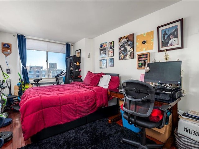 bedroom featuring hardwood / wood-style floors