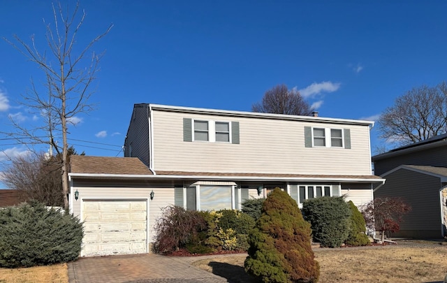 view of front property with a garage