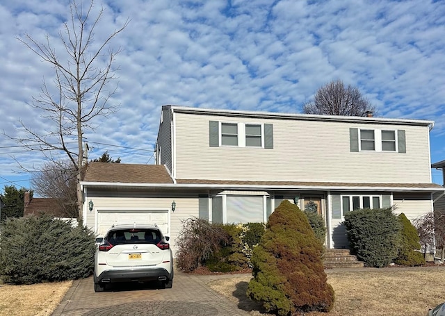 view of front of home featuring a garage