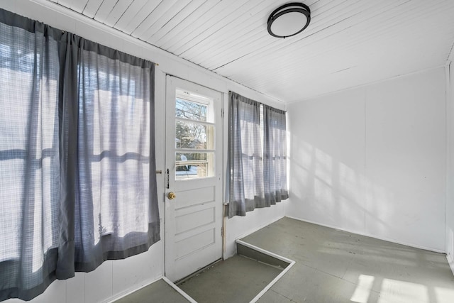 doorway featuring concrete floors