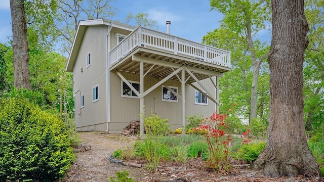 view of home's exterior with a deck