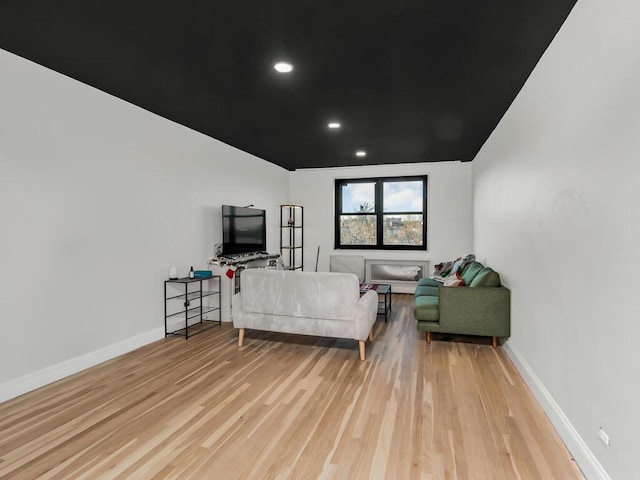 living room with light hardwood / wood-style floors