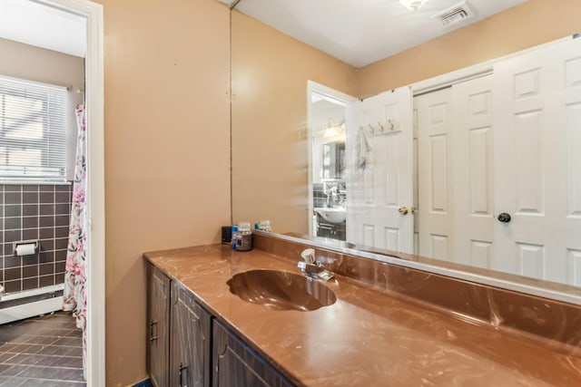 bathroom featuring vanity