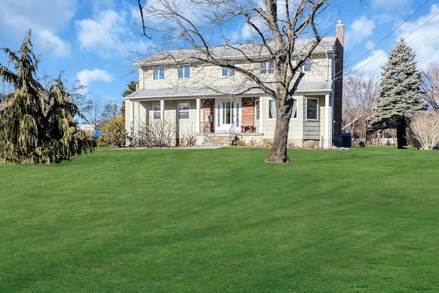 view of front property featuring a front yard