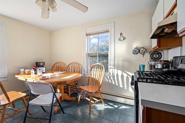 tiled dining room featuring ceiling fan