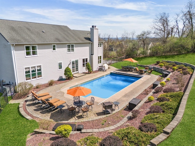 79 Victor Dr, Poughkeepsie, NY 12603 - view of swimming pool featuring a fenced in pool, cooling unit, fence, a lawn, and a patio