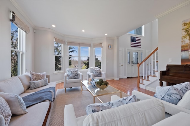 79 Victor Dr, Poughkeepsie, NY 12603 - living area with stairway, recessed lighting, light wood-style floors, and ornamental molding