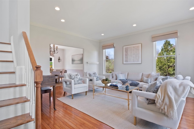 79 Victor Dr, Poughkeepsie, NY 12603 - living area with stairway, wood-type flooring, ornamental molding, and plenty of natural light