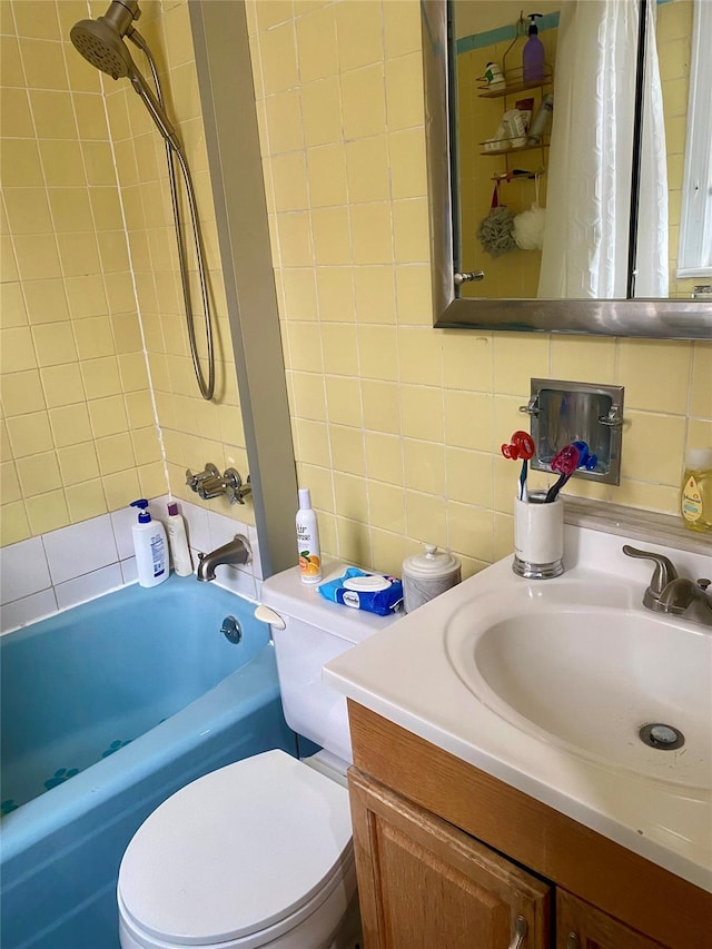 full bathroom featuring toilet, tasteful backsplash, tile walls, vanity, and shower / bath combo