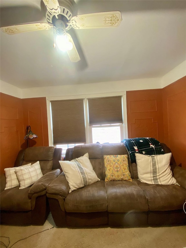 living room featuring ceiling fan