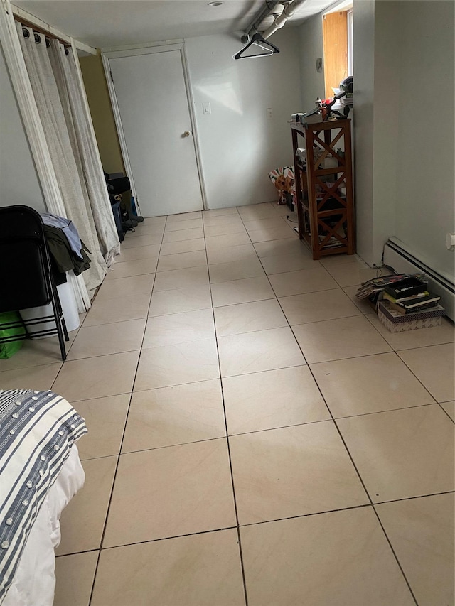 corridor with light tile patterned floors