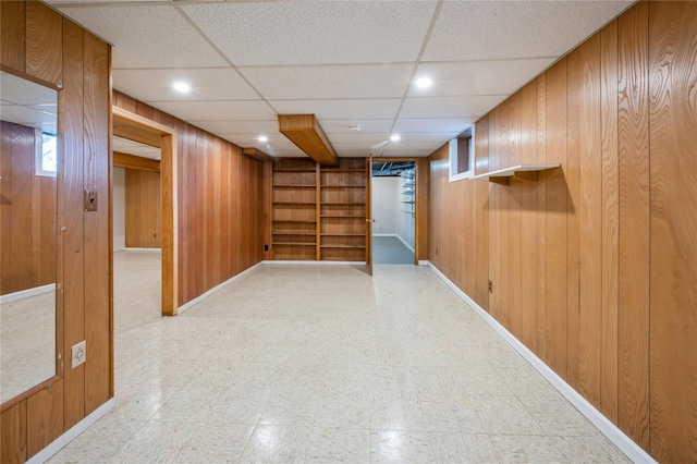 basement with wooden walls