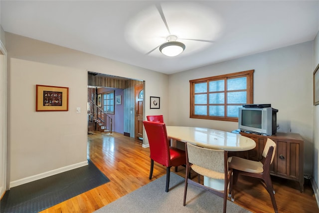 dining space featuring hardwood / wood-style floors