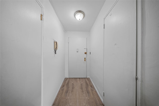 hallway featuring light wood-type flooring