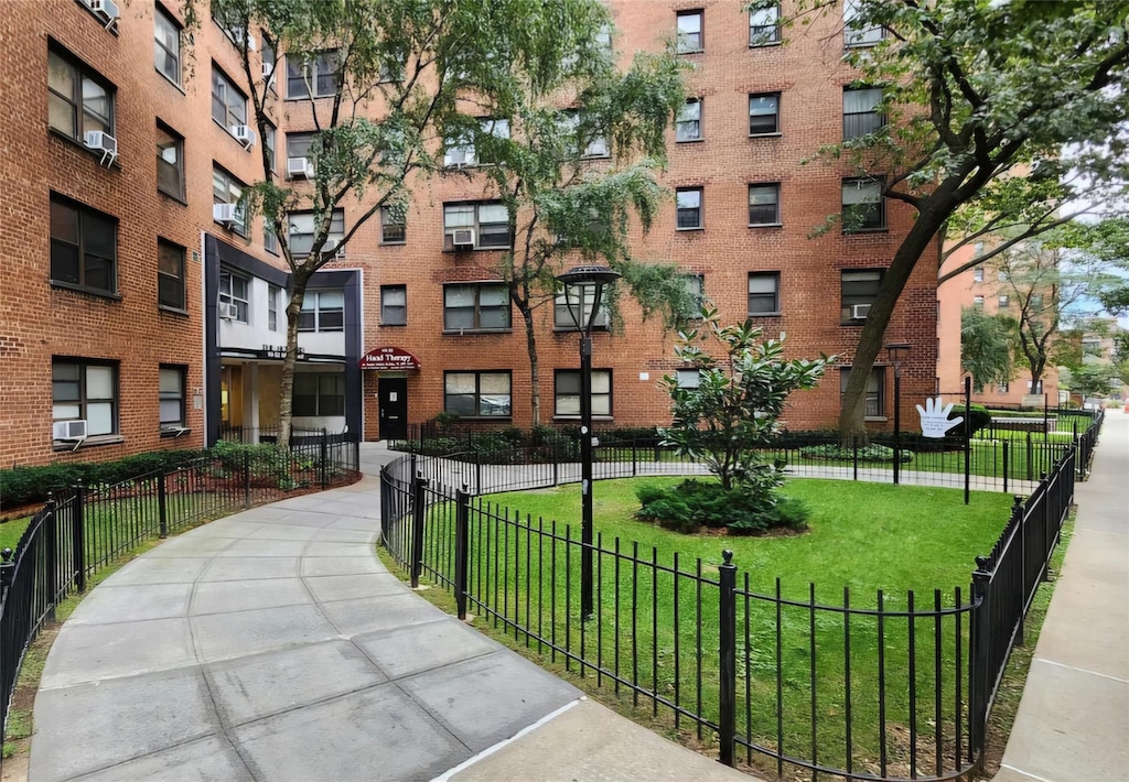 99-52 66th Rd Unit 1F, Rego Park, NY 11374 - view of building exterior with cooling unit