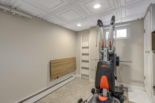 workout area with a baseboard radiator