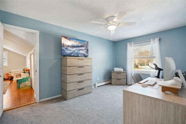 office area featuring ceiling fan, a baseboard radiator, and light colored carpet