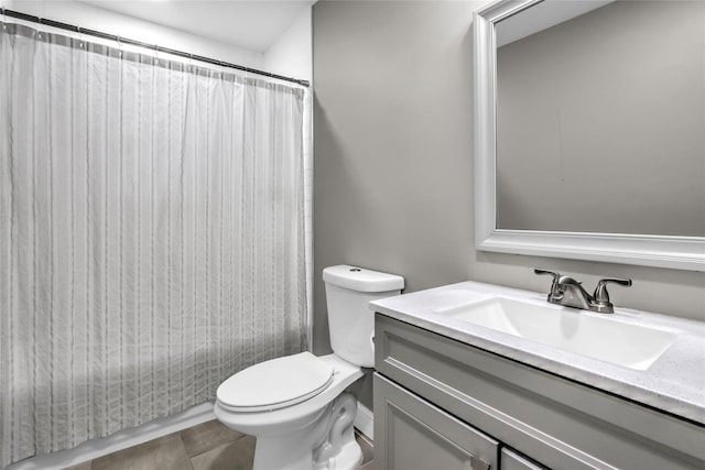 bathroom with vanity, toilet, and a shower with shower curtain