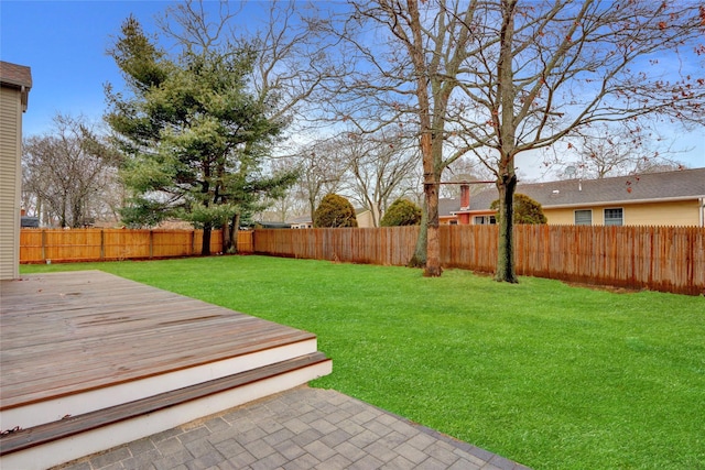 view of yard with a wooden deck