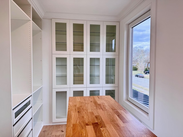 spacious closet with light hardwood / wood-style floors