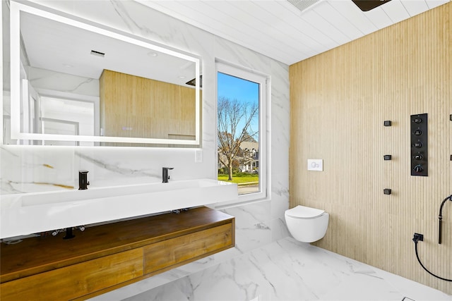132 Arthur St, Garden City, NY 11530 - full bathroom with marble finish flooring and vanity